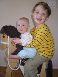 Eric and Joël riding the horse